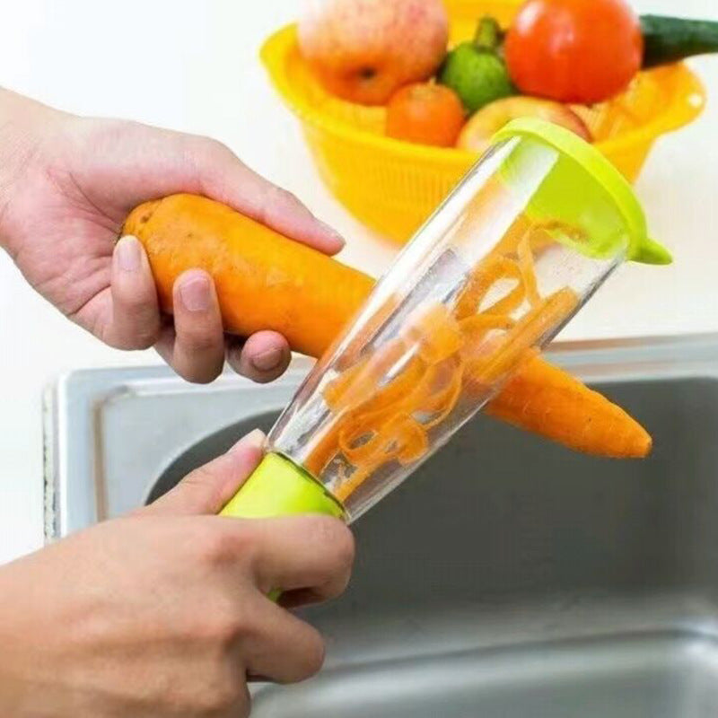 Person using a carrot peeler with a clear handle and green accents over a sink.