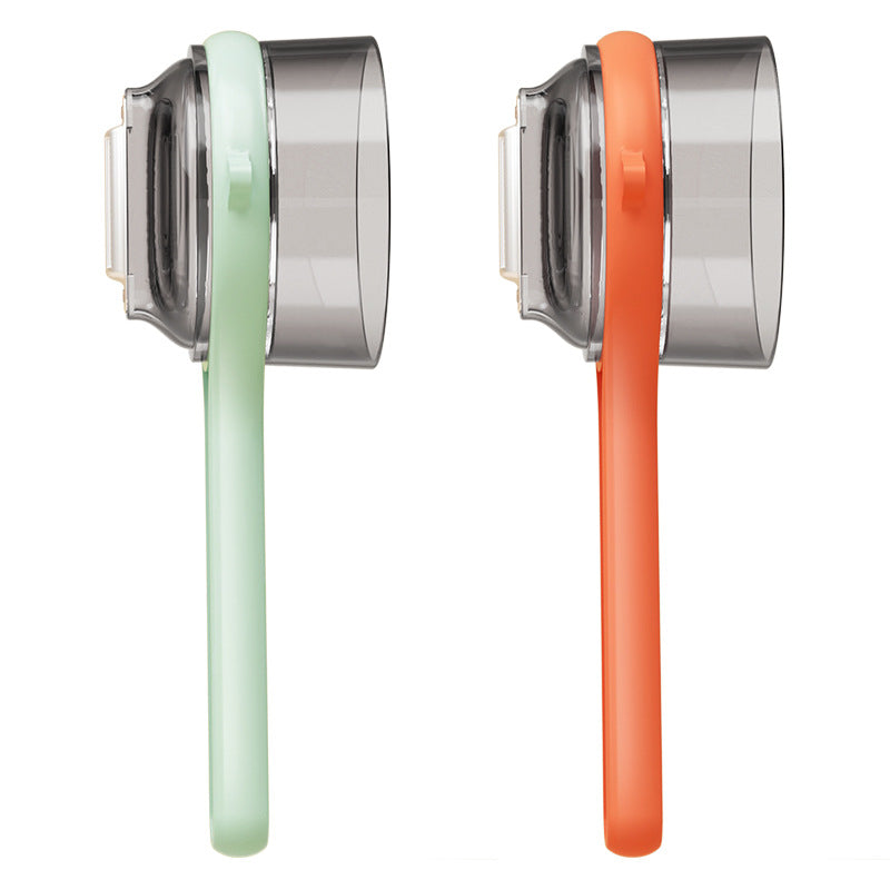 Two door handles, one green and one orange, on a white background