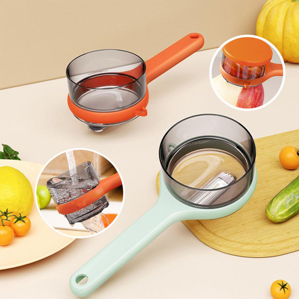 Two kitchen tools with orange and green handles on a beige surface with vegetables.