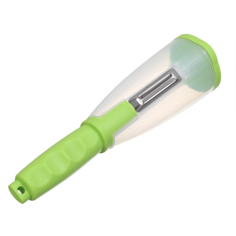 Green kitchen tool with a transparent handle on a white background