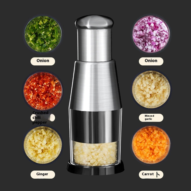 Silver pepper grinder with various ground spices displayed around it on a dark background
